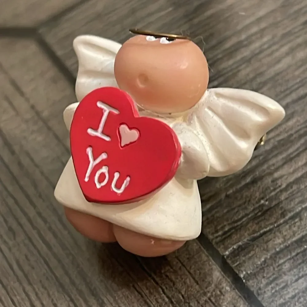 Kirk’s Angel Cheeks Angel Holding a Red Heart “ I ❤️ You”